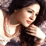Ayesha Omer in white suit
